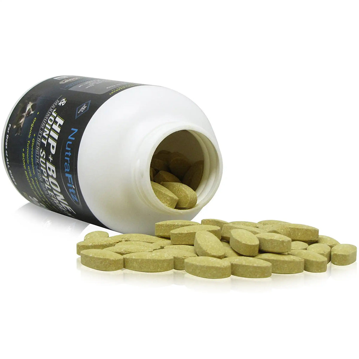 Open bottle of supplements with tablets spilling out on a white background