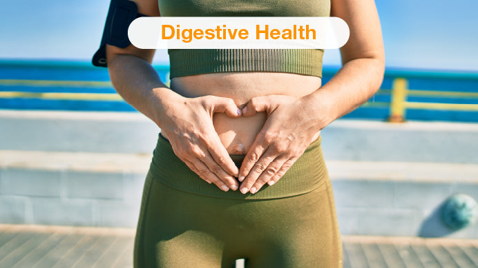 A woman with two hands over her belly making a heart sign, text: digestive health. 